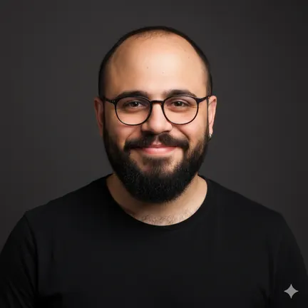 Headshot of Doğan, co-founder of Qualia